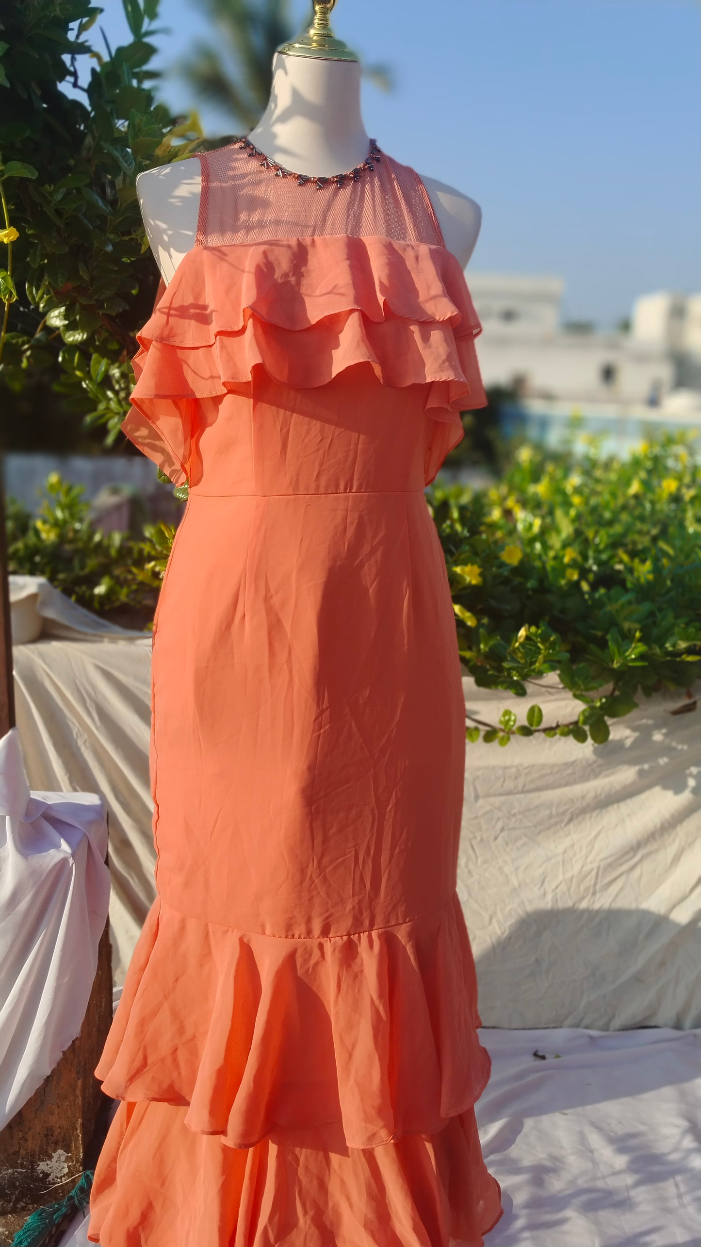 SLEEVELESS TIERED GOWN WITH RUFFLES